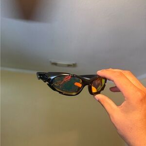 Sporty Black Sunglasses with Amber Mirrored Lenses Oakley Oakleys